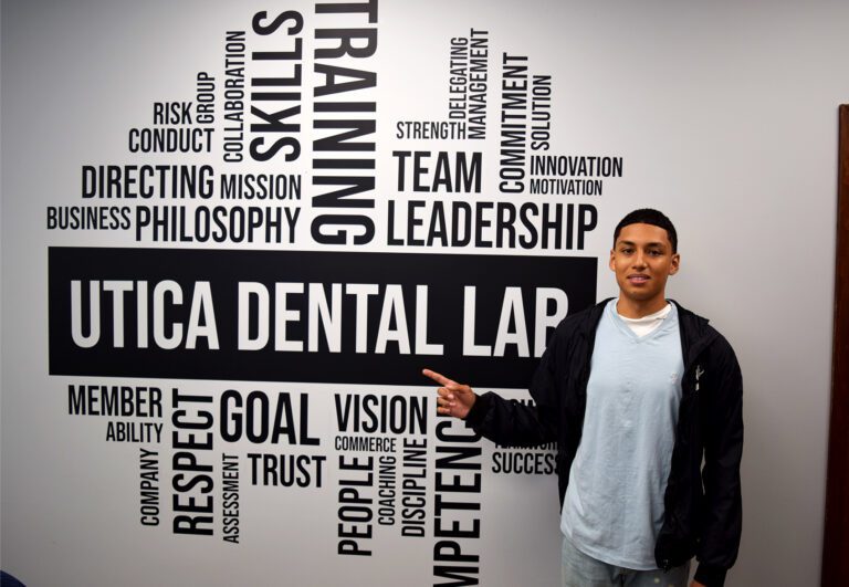OHM BOCES Student poses for picture at Utica Dental Lab